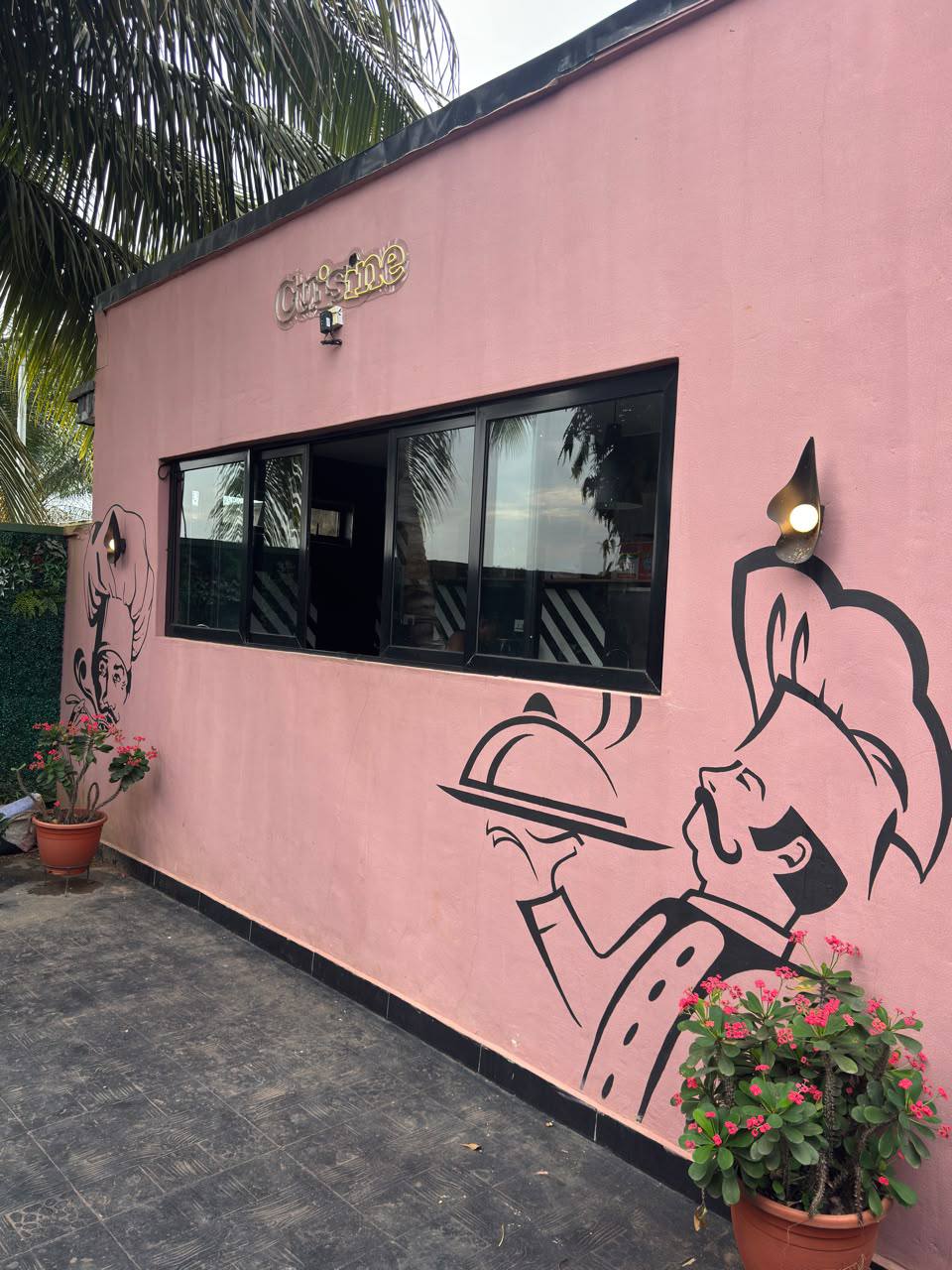 Nova Arena kitchen exterior with chef artwork